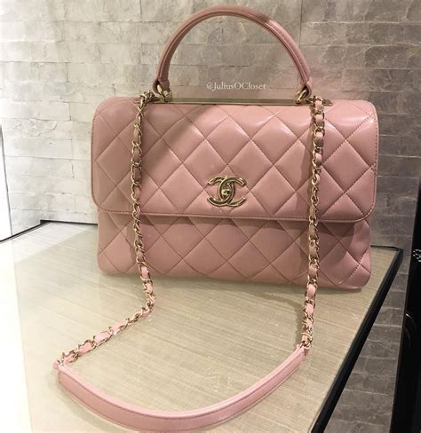 pink chanel flap bag with top handle|Chanel small lambskin evening bag.